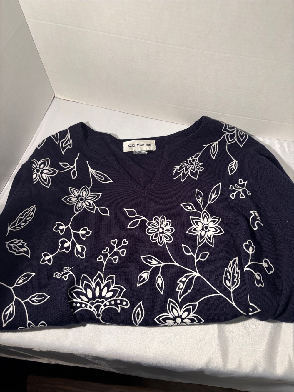 C.D. Daniels Navy V-Neck Sweater with White Floral Embroidery
